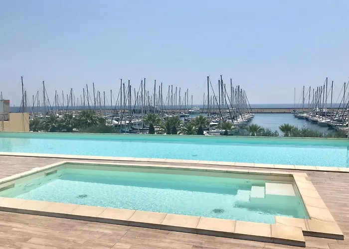 Guesthost - Aregai Marina Exclusive Seaside Appartement