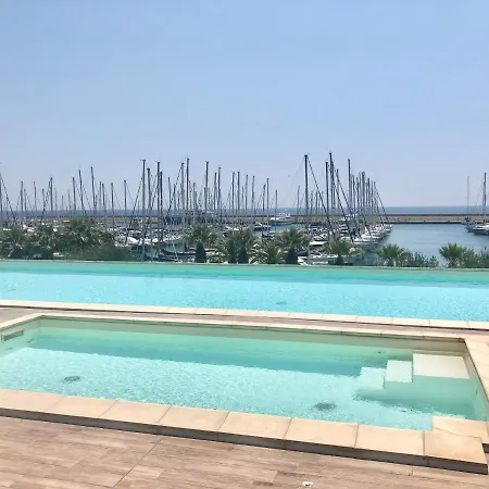Guesthost - Aregai Marina Exclusive Seaside Appartement